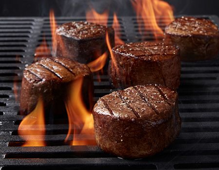 Sear steaks on gas grill.