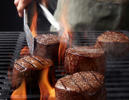 Remove steaks from grill.