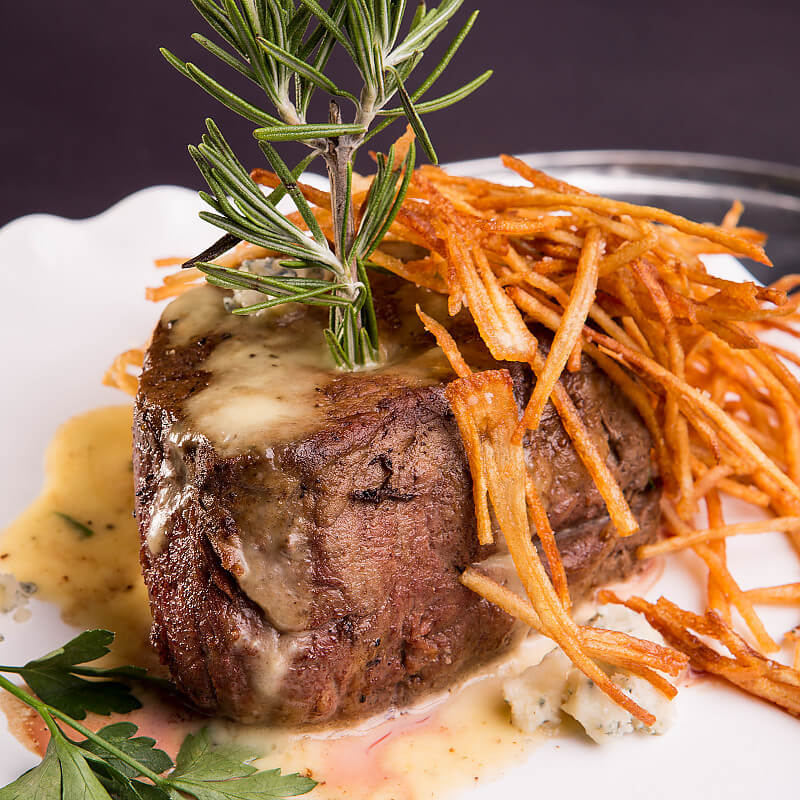 Tenderloin Steaks with Blue Cheese Sauce and Rosemary Potato Sticks