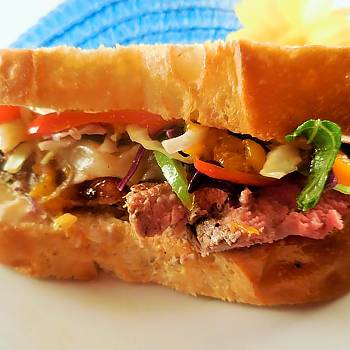 Bulgogi Pepper Ribeye Sandwich with Citrus Cabbage Mandarin Mango Slaw recipe